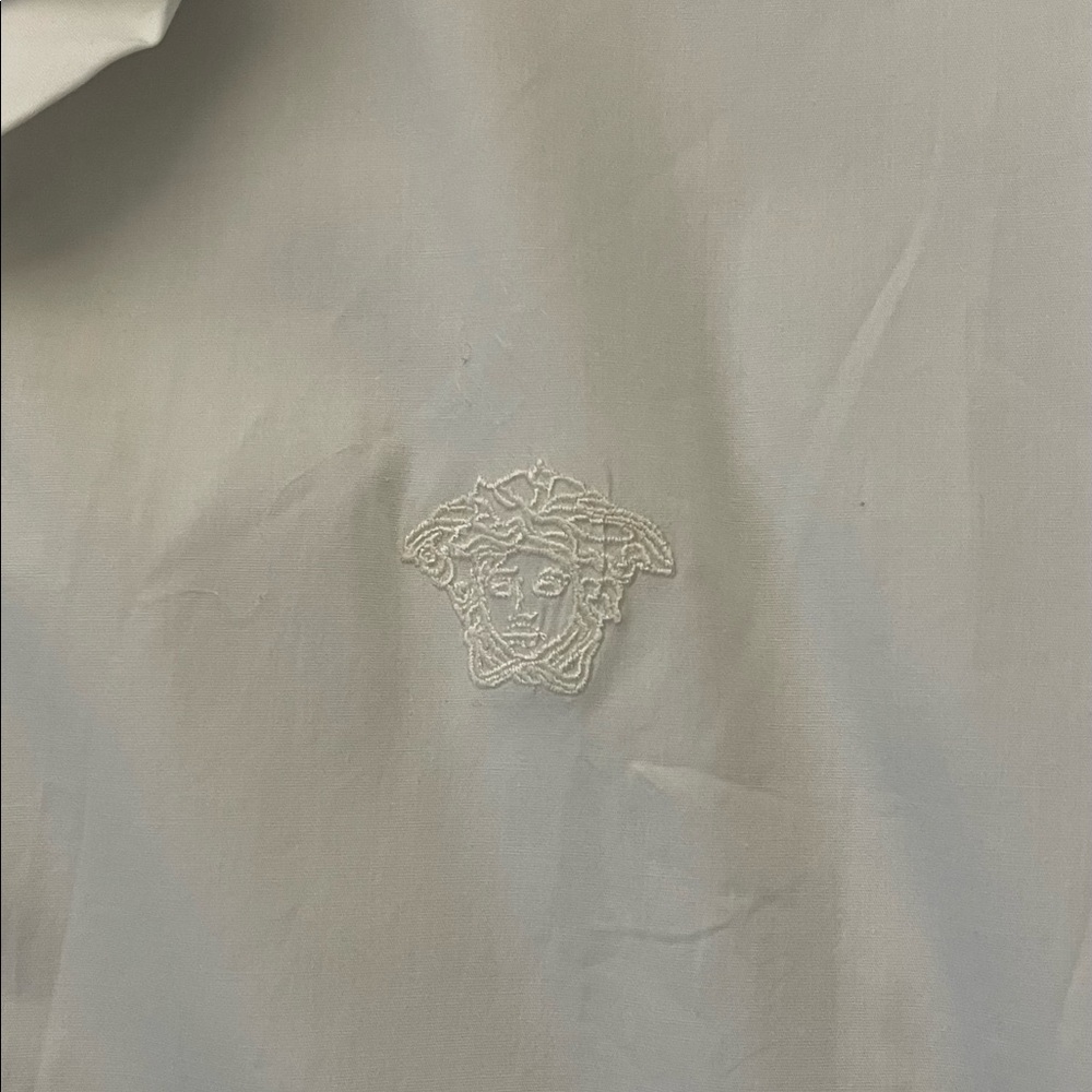 Brand new  authentic Versace long sleeve